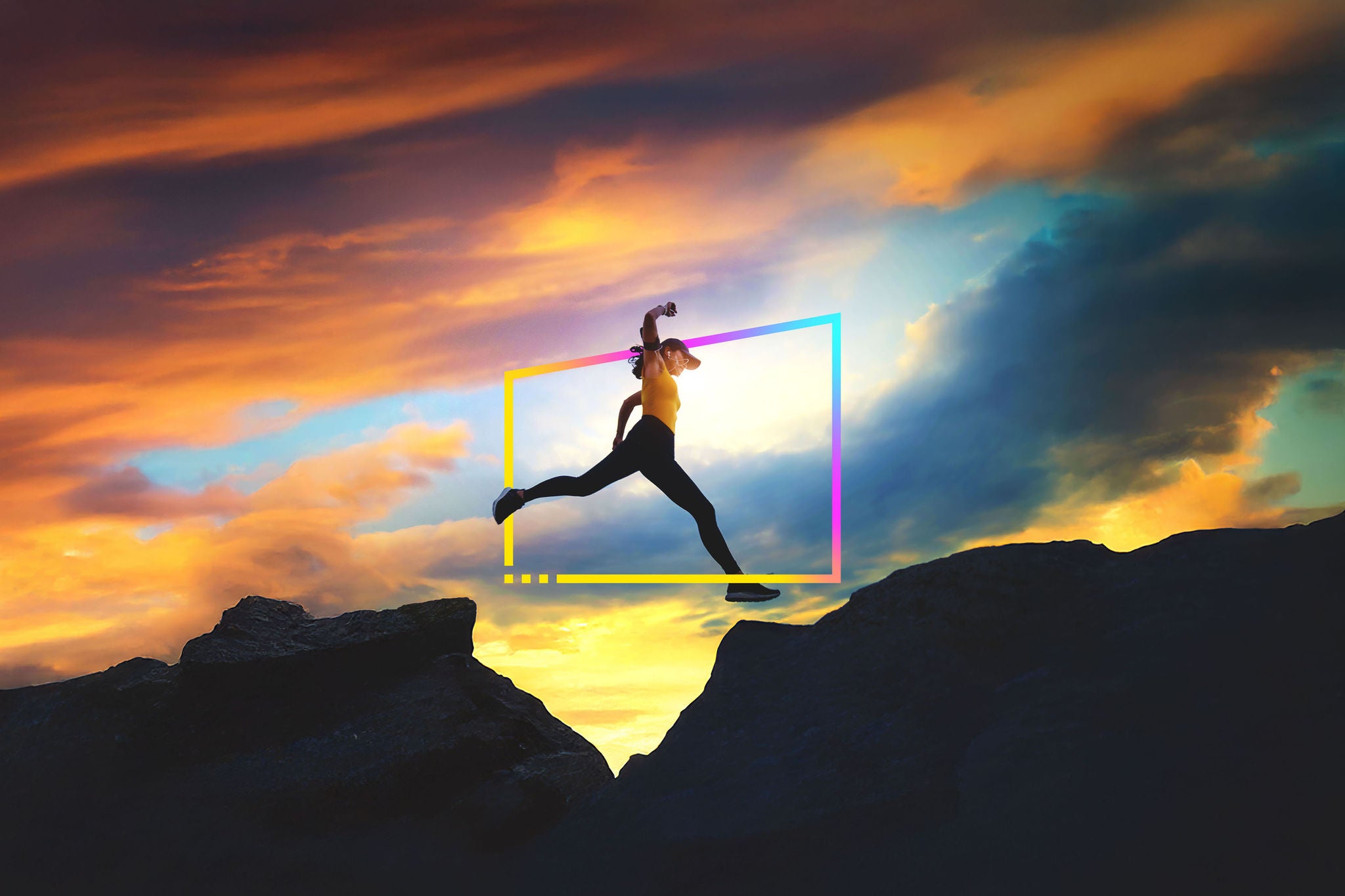 Asian woman runs and jumping on mountain ridge at sunset