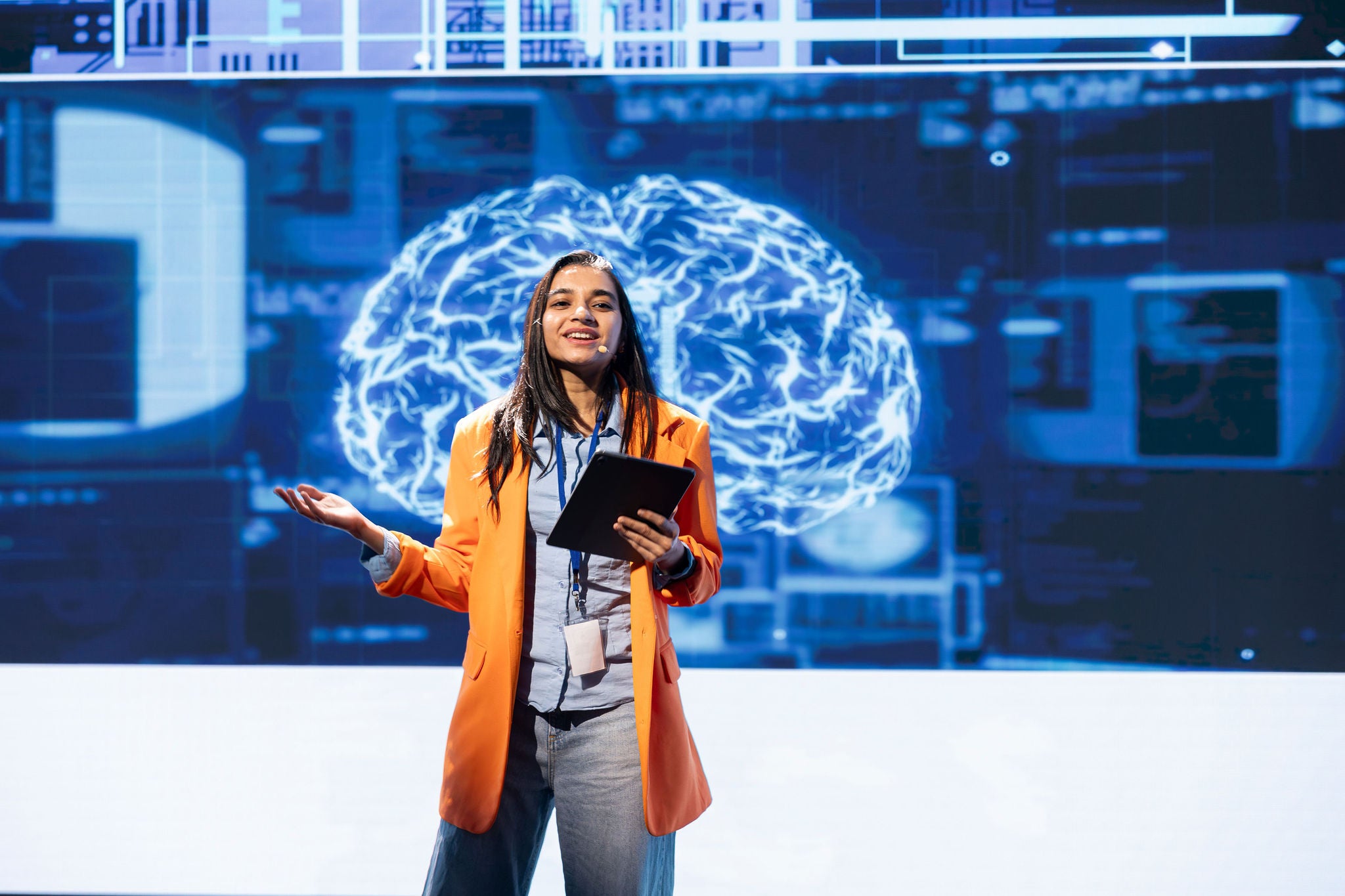 Talking at AI expo using mic and tablet