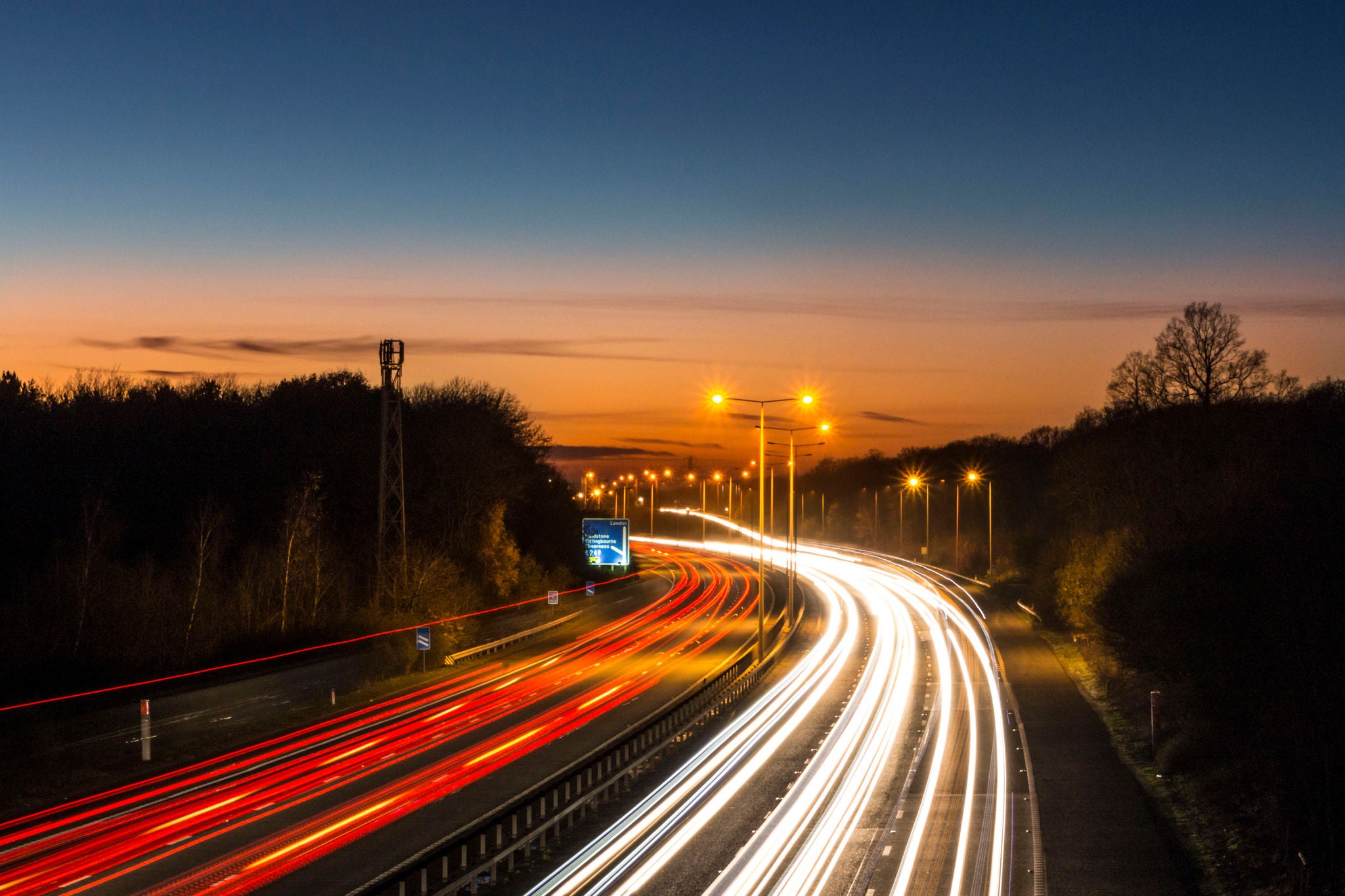Car light trails on the M20 motorway in Kent, UK