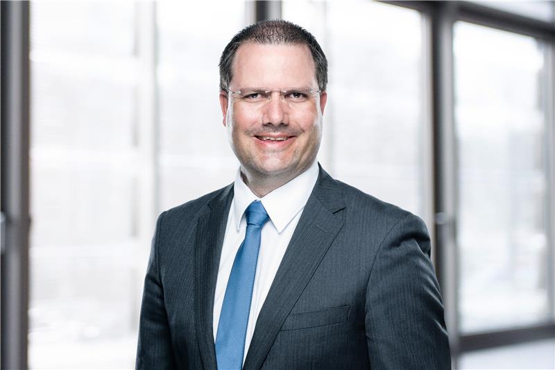 Photographic portrait of Tom Schmidt